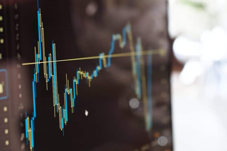 detailed view of financial trading graphs on a monitor illustrating stock market trends